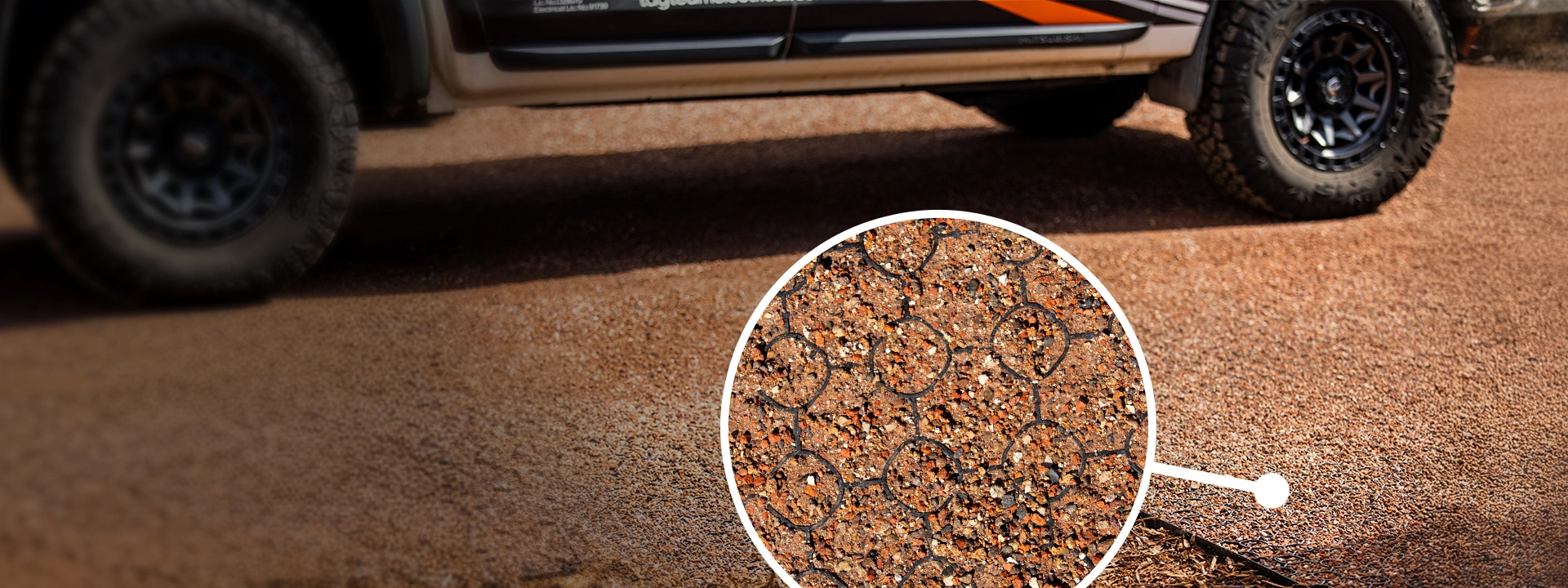 Trex Ground Stabilisation System in use showing vehicle on stabilised gravel surface