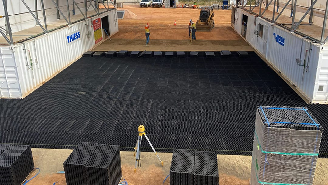 Interlocking ground stabilisation grid installed and filled with aggregate on a project site